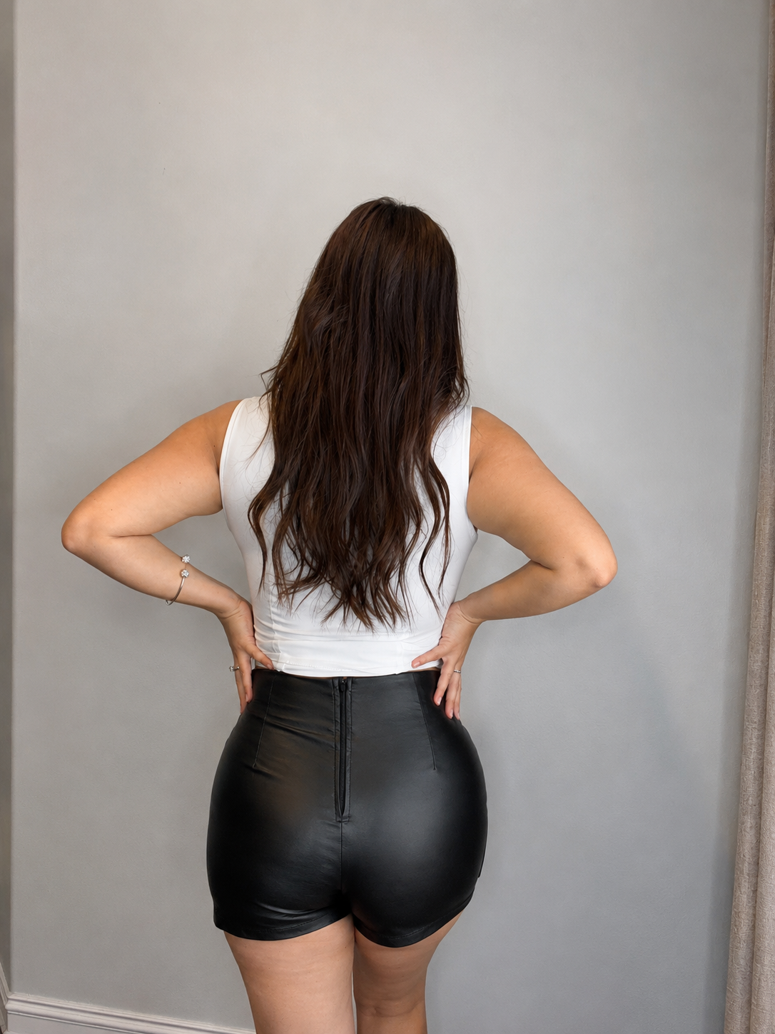 Skort with stretch fabric and back zipper. Shorts in the back and skirt in the front.